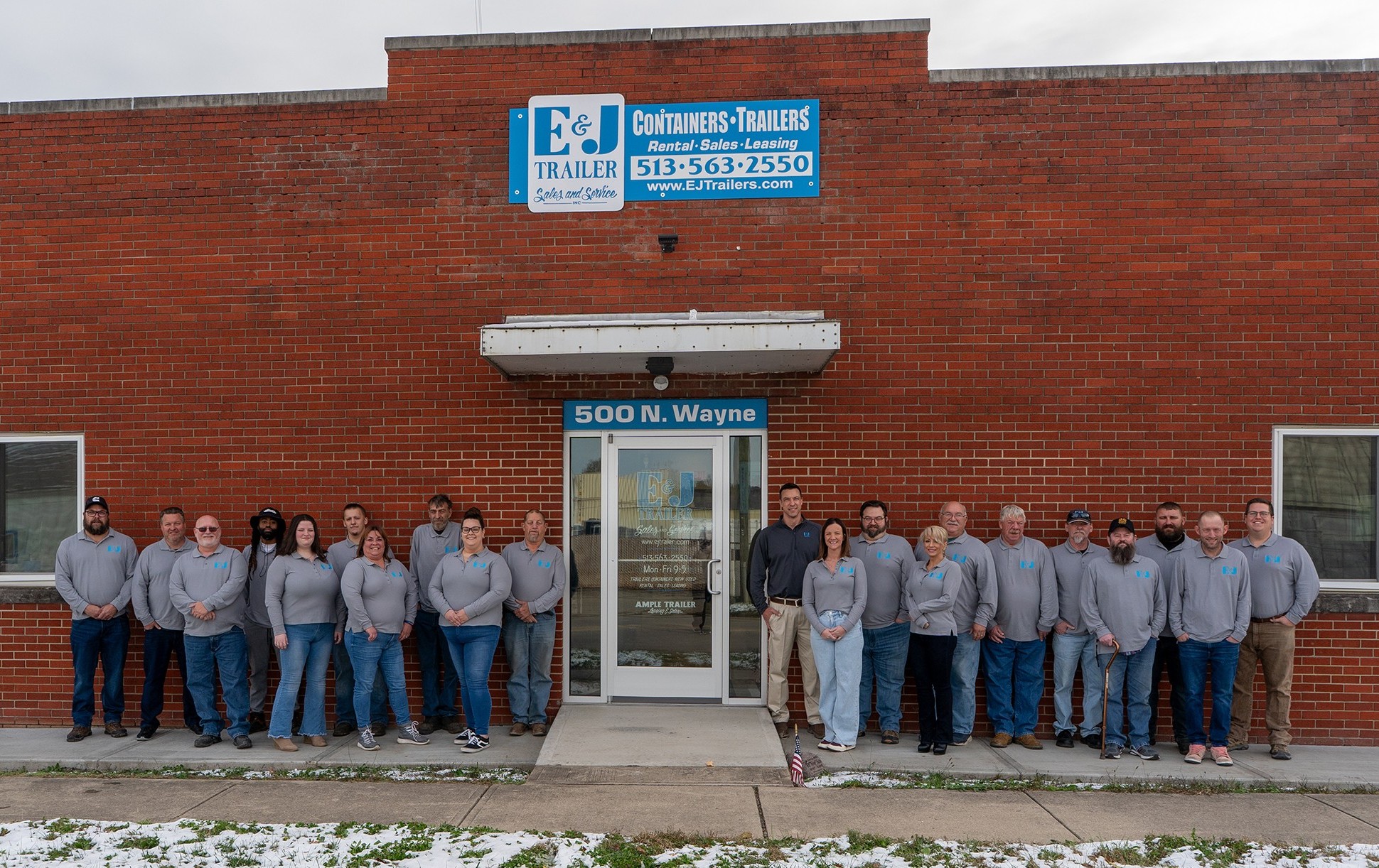 E&J Trailer Team Photo The E&J Trailer team standing together in front of the 500 N. Wayne Cincinnati office, representing our locally owned and family-operated staff.